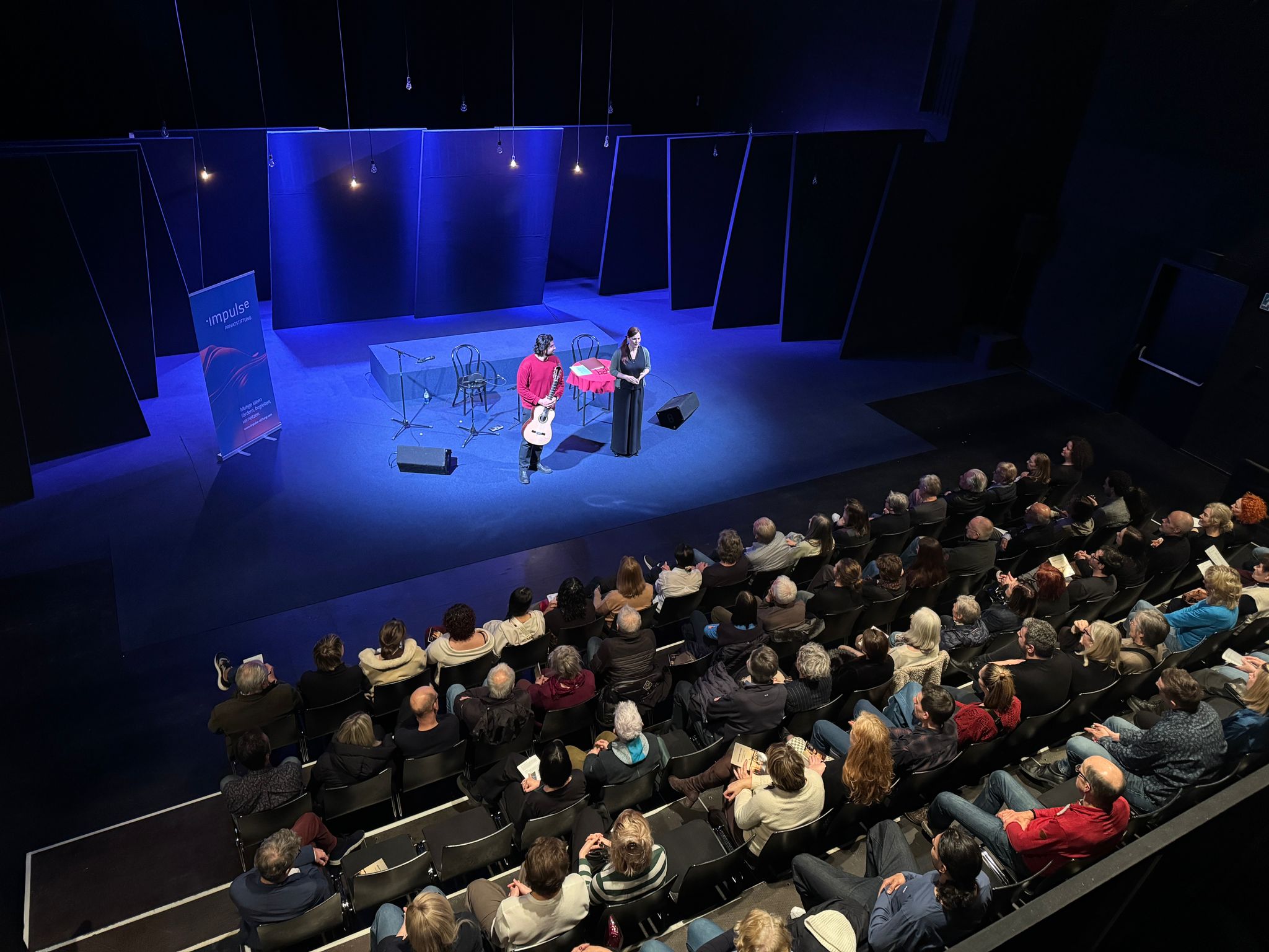 Sabine Lorenz and Amin Asgari on stage